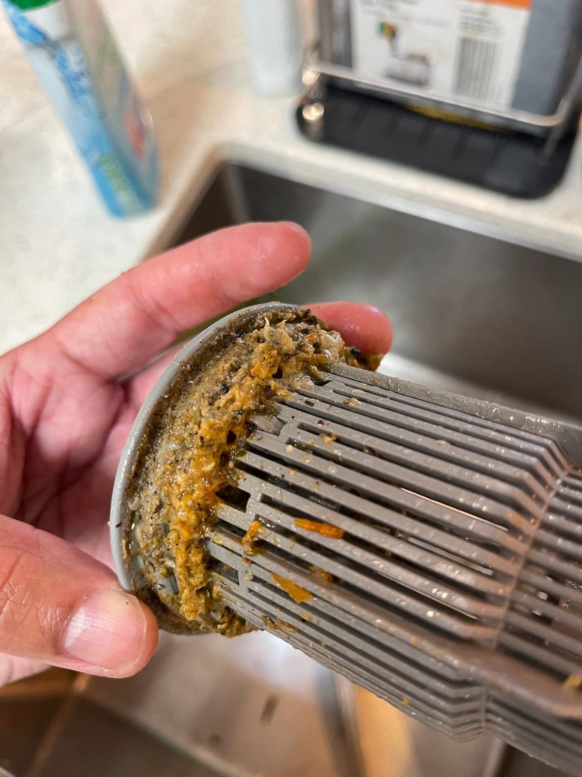The same filter from the side, showing how far the build-up extends.