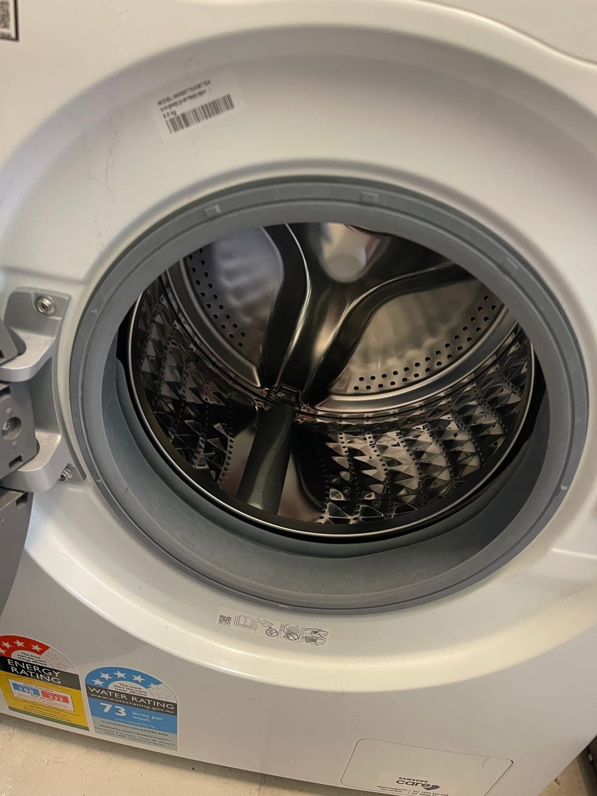 A clean front loader drum after the machine has been serviced.