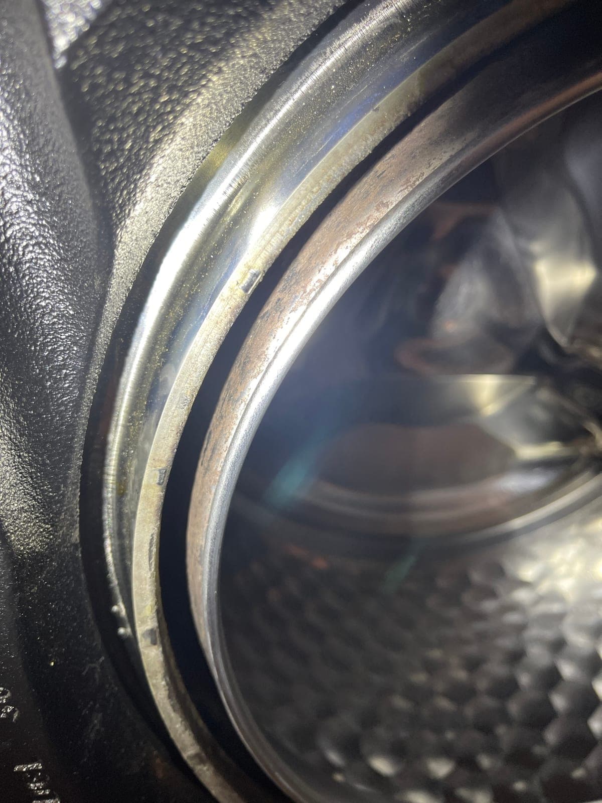 The rim of a front loader drum during a service.