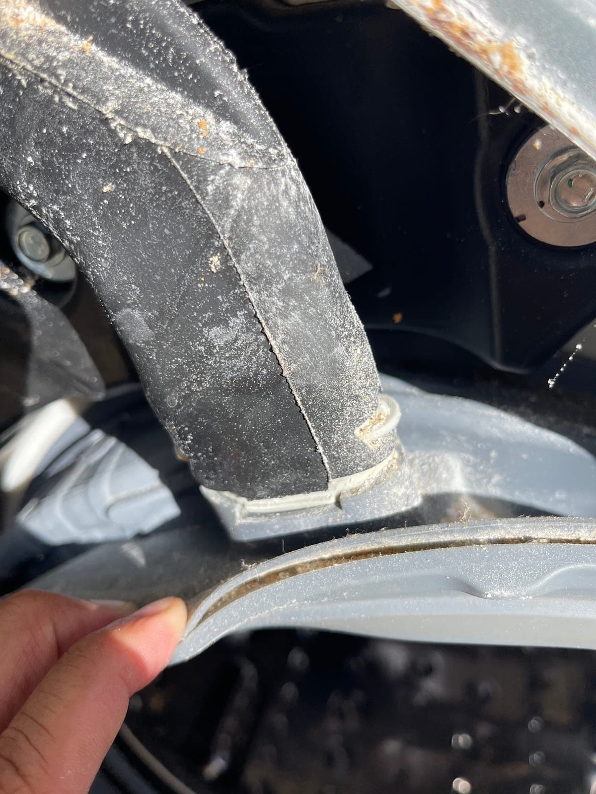 A sump hose removed and found blocked with lint.